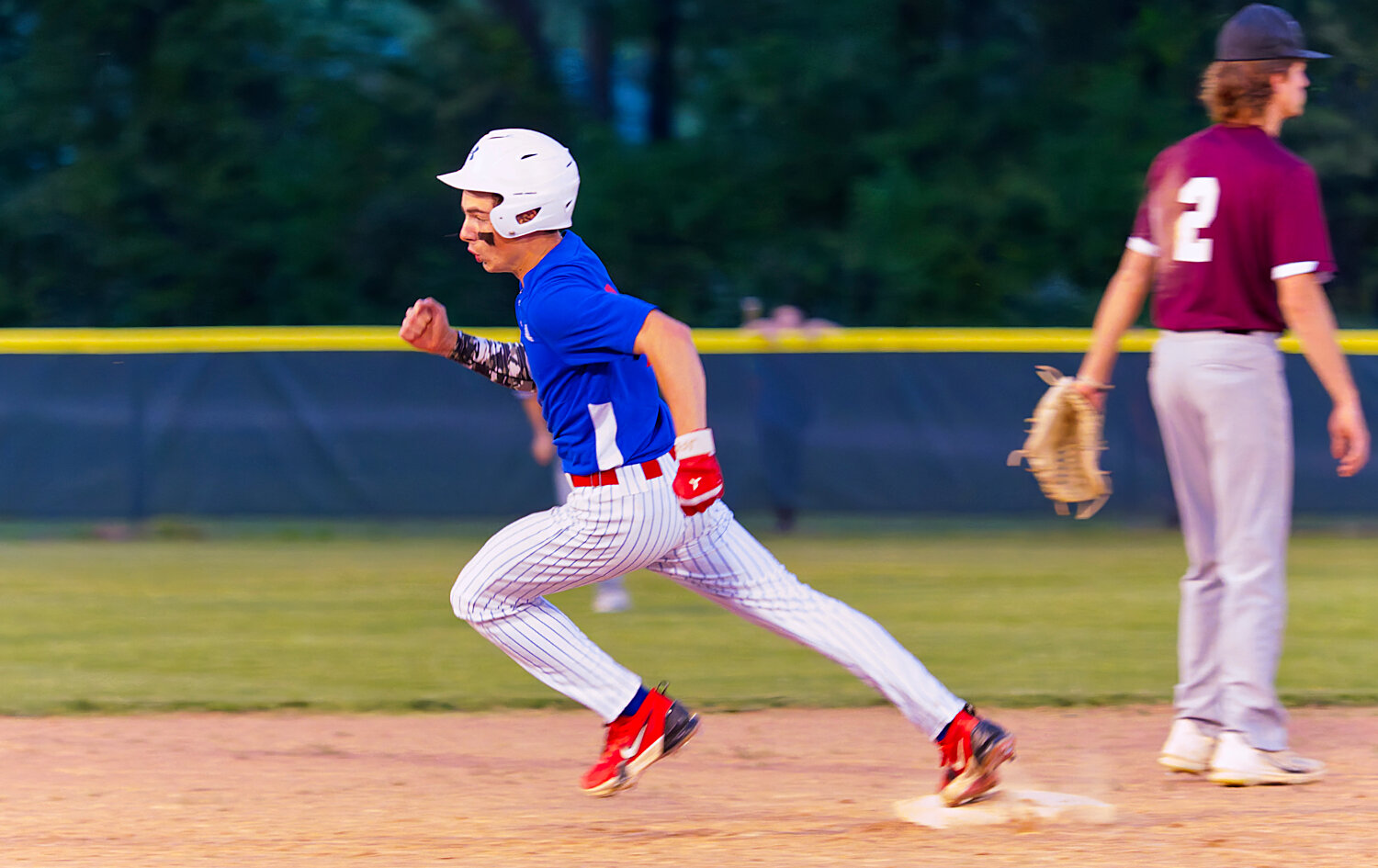 Michael Lacy speeds around second base. [preview further panther photos]